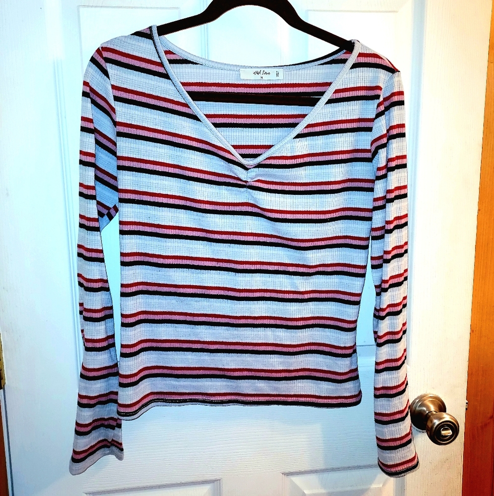 A stripped xL, long sleeve shirt